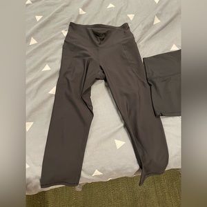 Package of two black athletic leggings old navy and aerie